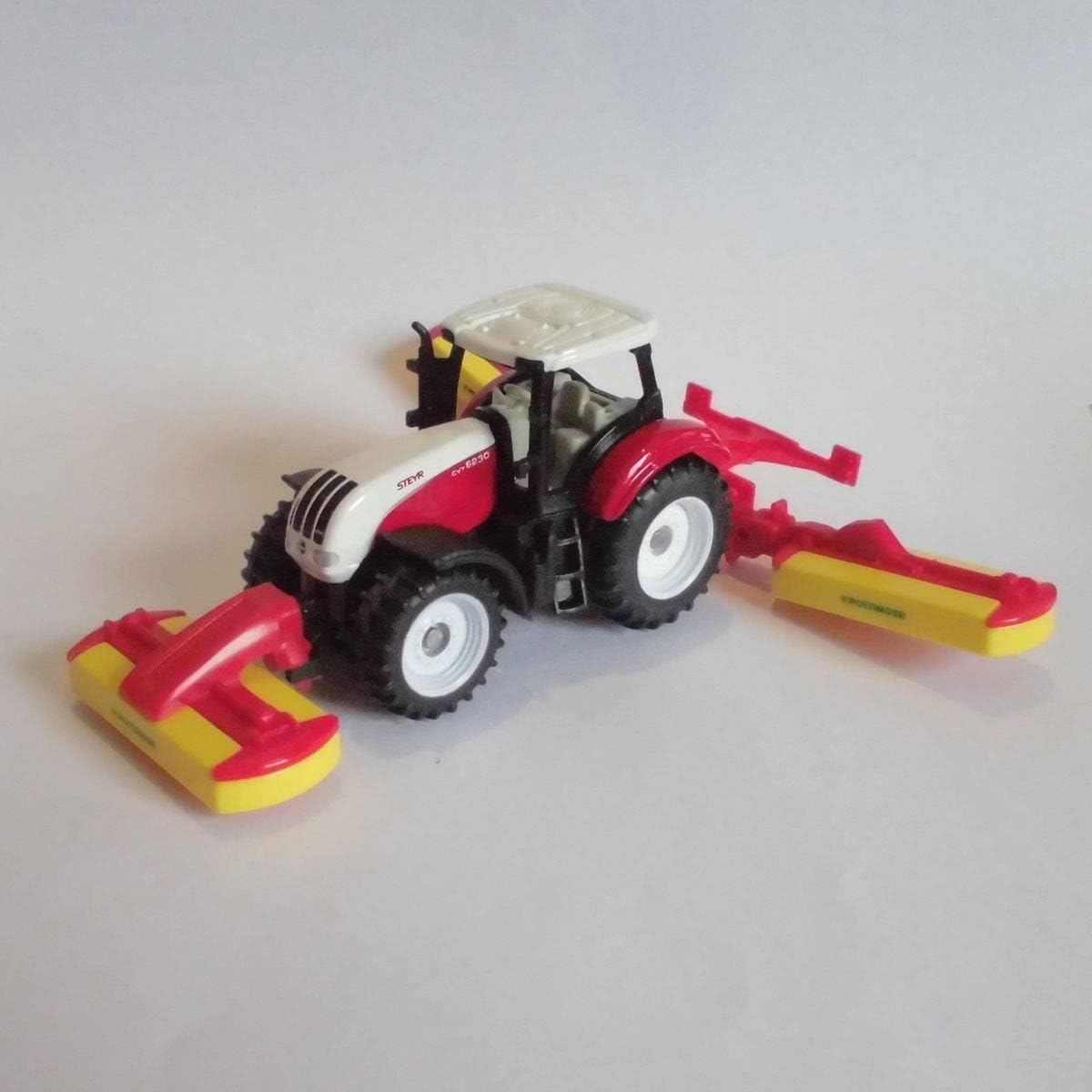 SIKU Steyr Traktor mit Pöttinger Mähwerk - Detailgetreues Spielzeugmodell für Sammler